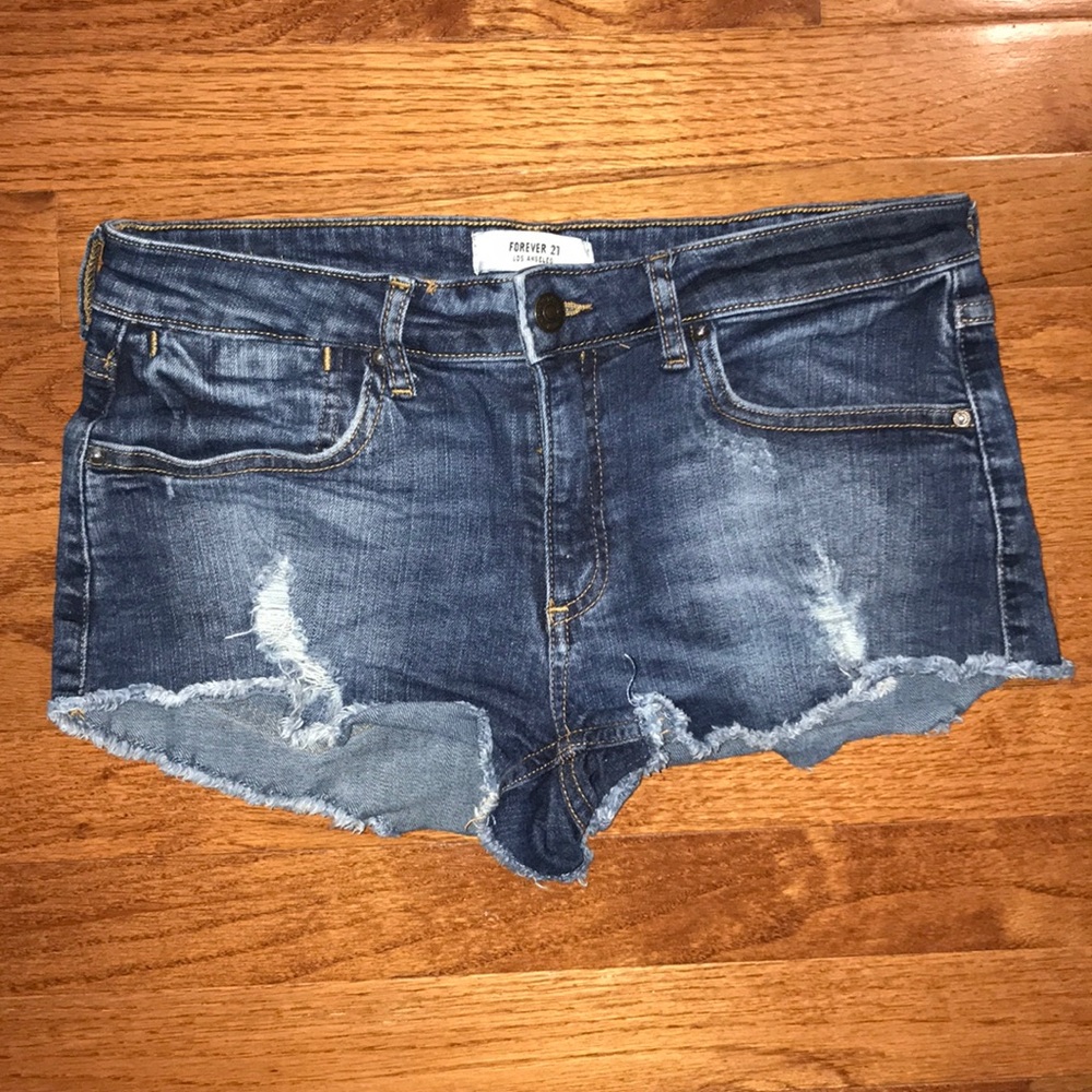 blue light wash jean shorts with small rips